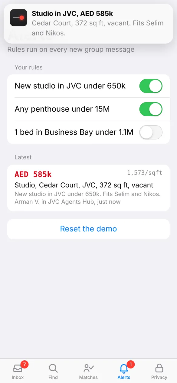 An alert on a phone: a new studio in JVC at AED 585k.